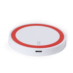 A wireless charger in white with a red circular accent on the edge and a USB port on the side.