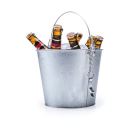 A metal ice bucket filled with ice and alcoholic drink bottles, featuring a handle and condensation on the surface.