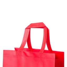 A red Kustal Bag with two sturdy handles, featuring a simple design and made from durable material.