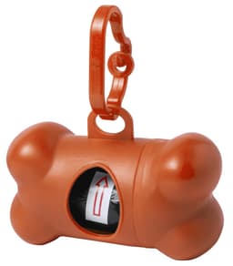 An orange bone-shaped waste bag dispenser with a clip, featuring a roll of waste bags inside.