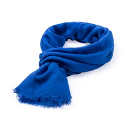 A blue scarf with frayed ends, featuring a soft texture and a casual drape, includes a branding logo.