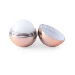 A lip balm container featuring a shiny rose gold exterior with a white, spherical balm inside.