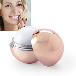 A rose gold lip balm container with a smooth white centre, accompanied by an image of a smiling person applying it.