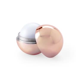 A rose gold lip balm container with a metallic finish, featuring a rounded lid and a white balm inside.