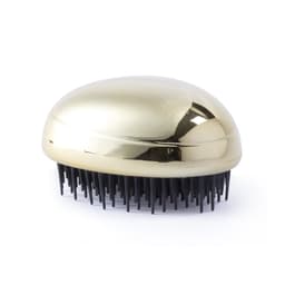 A hairbrush with a shiny gold and black colour scheme, featuring a smooth, rounded design and plastic bristles.