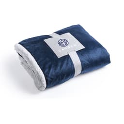 A navy blue blanket with a soft, fluffy white underside, neatly folded and secured with a tag.