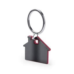 A keyring shaped like a house, featuring a black body with a red edge and a metal ring.