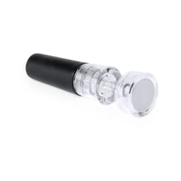 A drink bottle stopper in black and clear, with a cylindrical design and a shiny circular top.