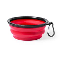 A red collapsible pet bowl with a black rim and a metal carabiner for easy attachment.