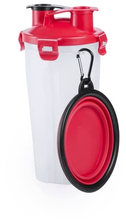 A drink bottle in white with a red lid, featuring a black and red collapsible pet bowl attached with a carabiner.