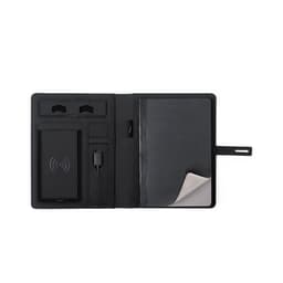 A black Weston Notebook with compartments for a phone, business cards, and a notepad. It has a logo on the cover.