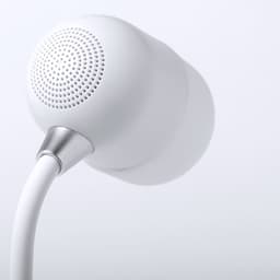 A white multifunction lamp with a rounded design and a metallic accent on the base, featuring a wireless charger.