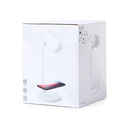 A white multifunction lamp with a wireless charging base and Bluetooth features in a promotional box.
