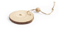 A wooden round decoration with a textured surface and a hanging string, featuring a small bead.