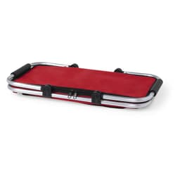 A red insulated picnic set with a sleek design and metal handles, featuring a logo on the surface.