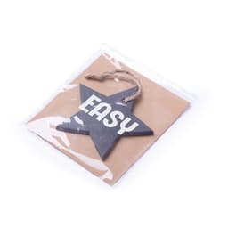 A star-shaped decoration in black with a jute string, packaged on a brown backing card. It features the word "EASY."