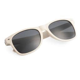 A pair of cream-coloured sunglasses with dark lenses, featuring a logo on one side.
