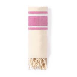 A bath towel in cream with pink and white stripes, featuring fringed edges and a logo.