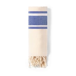 A bath towel in cream and blue stripes, featuring tasselled ends and a woven design. It has a branding logo.