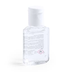 A transparent hand sanitiser bottle with a white cap, featuring a branding logo and safety symbols on the label.