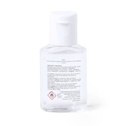 A transparent bottle of hand sanitiser with a white cap, featuring a logo and ingredients listed on the back.