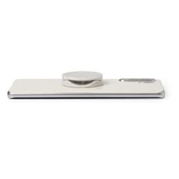 A white phone stand with a circular attachment at the centre and a silver edge. It has a sleek design and a minimalist look.