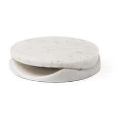 A round, white phone stand made from marble, featuring a smooth top surface and a curved base for stability.