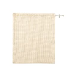 A cream-coloured bag made from woven fabric with a drawstring closure. It features a logo.