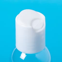 A clear, plastic bottle with a white flip-top cap, designed for hand sanitiser use.