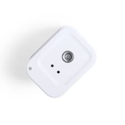 A white rectangular device with a circular nozzle, featuring two small indicator lights. It has a simple, sleek design.