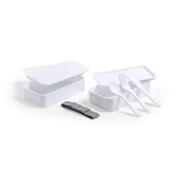 A white lunch box with two compartments, accompanied by a fork and spoon, and a striped elastic band.