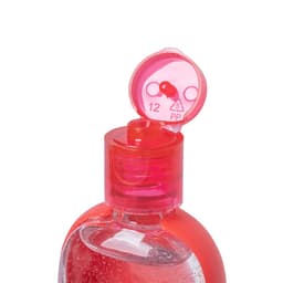 A bottle of hand sanitiser with a red cap, featuring a clear liquid and a branding logo on the bottle.