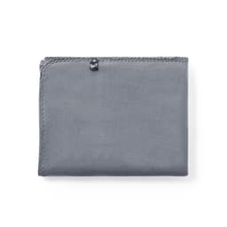 A grey blanket with a stitched edge and a small logo. Perfect for adding warmth to any space.