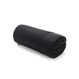 A rolled black blanket displaying a soft, smooth texture, featuring a small logo on one edge.