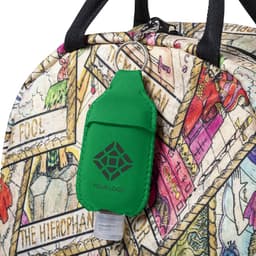 A green hand sanitiser pouch with a logo, attached to a patterned bag.
