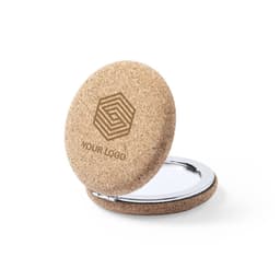 A round cork pocket mirror with a shiny silver interior and a logo on the outer surface.