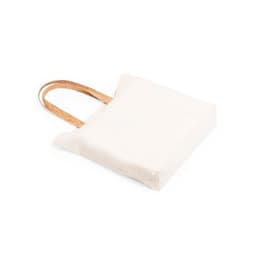 A cream tote bag with cork handles and a square shape. It features a simple design and no visible branding.