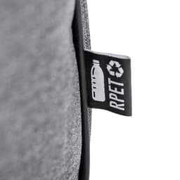 A grey bag with a textured surface and a label indicating it is made from recycled materials.