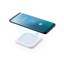 A smartphone in black hovering above a white wireless charger, displaying a battery icon on the screen.