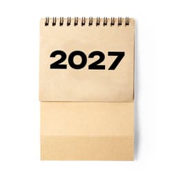 A desk calendar featuring a spiral binding, showcasing a simple design with the year 2027 in bold black text on a kraft background.