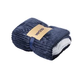 A folded navy blue blanket with a soft, white underside and a logo tag.