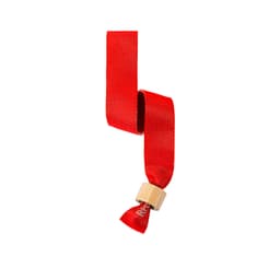 A red wristband made of fabric with a wooden clasp, featuring a logo. Suitable for events and exhibitions.