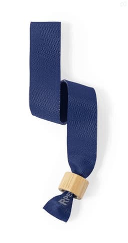 A navy blue wristband made of fabric with a wooden fastening. Features a logo on the wooden element.