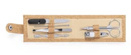 A manicure set with silver metal tools including scissors, nail clippers, and tweezers in a beige case.