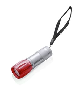 A small silver and red torch with a wrist strap, featuring a sleek design and a reflector at the end.