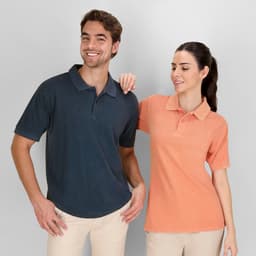 A navy blue polo shirt and an orange polo shirt, worn by a man and a woman, both featuring a logo.