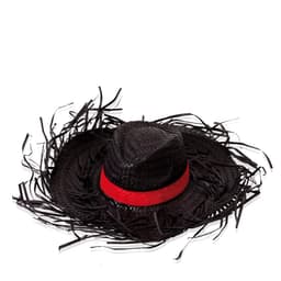 A black straw hat with fringed edges and a red band around the base, featuring a logo.