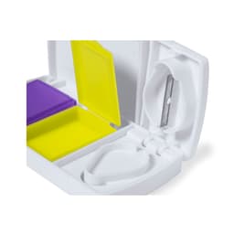 Aspirin pillbox in white with purple and yellow compartments, featuring a built-in knife for cutting pills.
