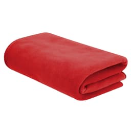 A folded red blanket lies flat, made from soft fleece material, featuring a simple design and a subtle logo.