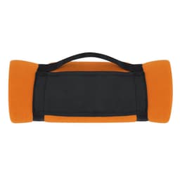 An orange mountain blanket with black accents and a carrying handle.